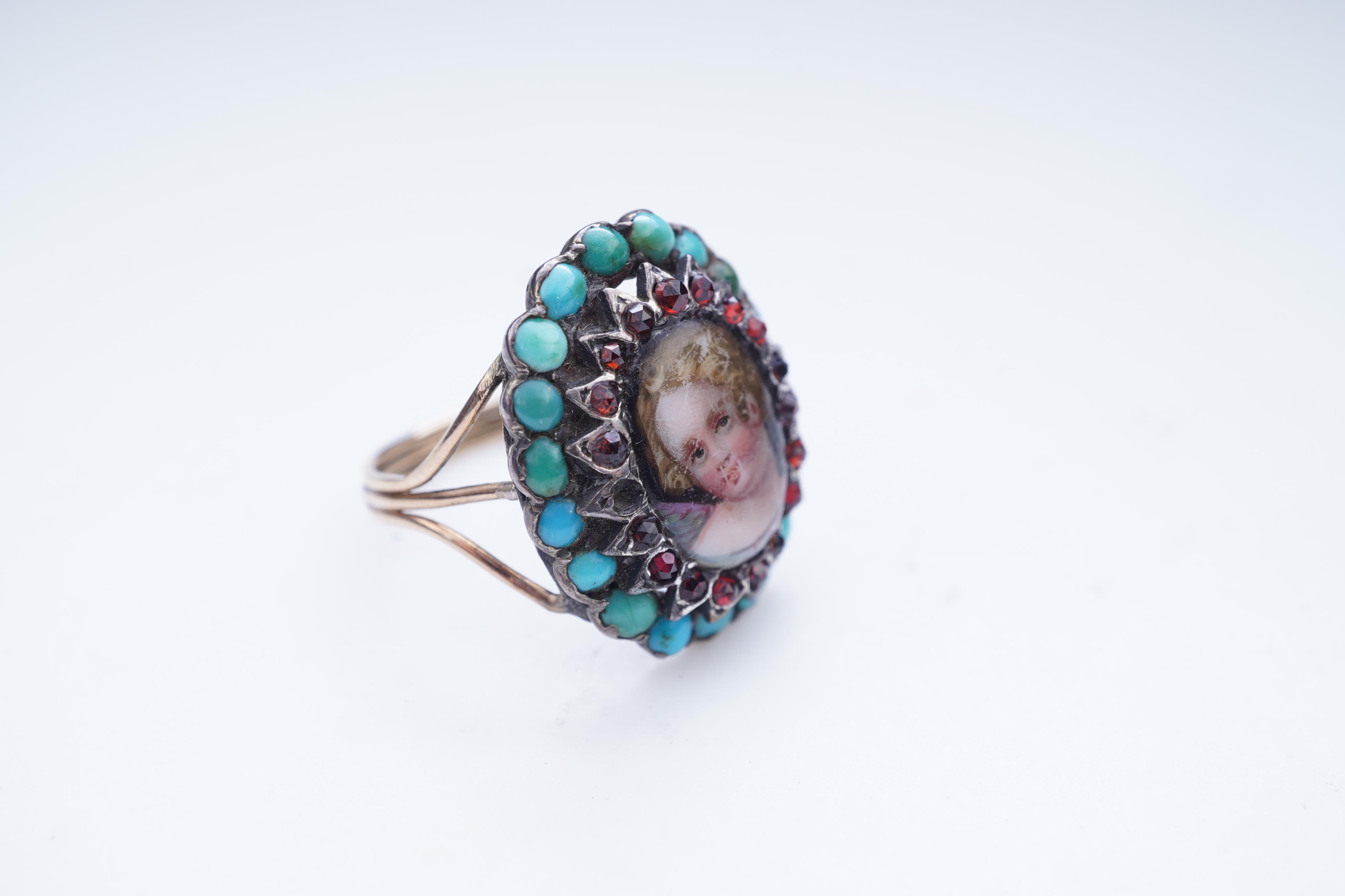 An enamel miniature, turquoise and garnet ring